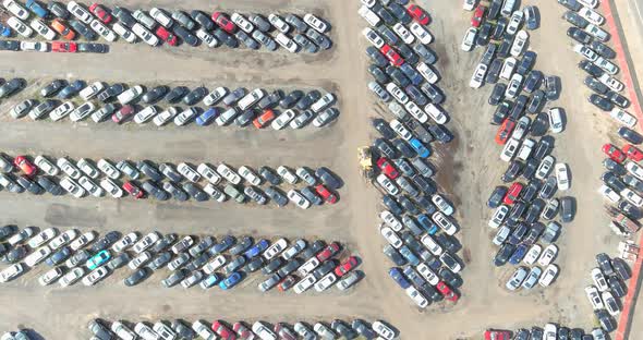 Rows of on cars parked in car parking auction lot alt