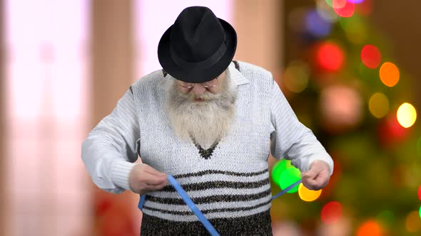 Displeased Senior Man Measuring His Belly alt