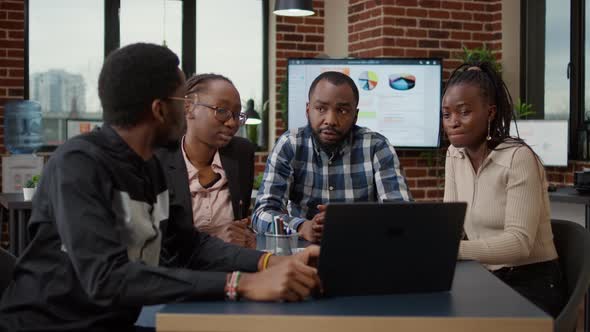 Team of African American People Meeting in Boardroom to Do Project alt