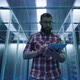 IT Engineer with Tablet in Server Room - VideoHive Item for Sale