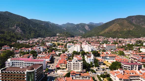 A drone flight over the resort town and hotels against the blue sky of the houses of the hotel compl alt