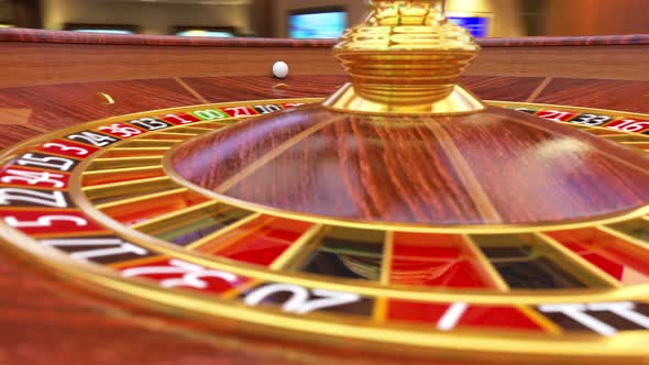 Roulette Ball is Rolling on the Roulette Wheel and Gamblers Bet for Black or Red alt