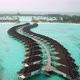 Drone Video of Exotic Turquoise Paradise and Water Villa Bungalows Maldives - VideoHive Item for Sale