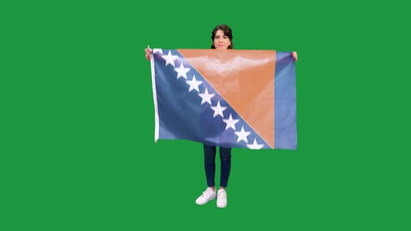 Woman Holding Flag Bosnia Herzegovina alt