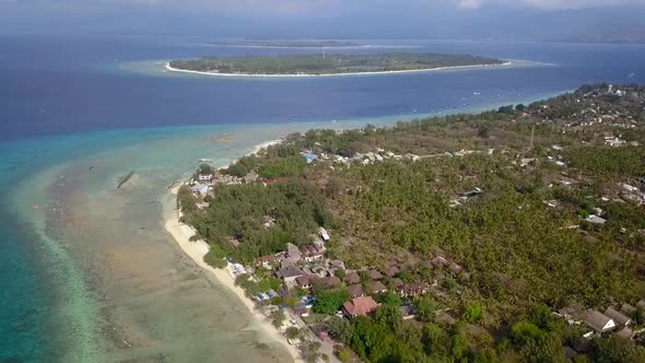Very high three islands viewed from above. Gili Trawangan, Air, Meno.Tranquil aerial view flight pa alt