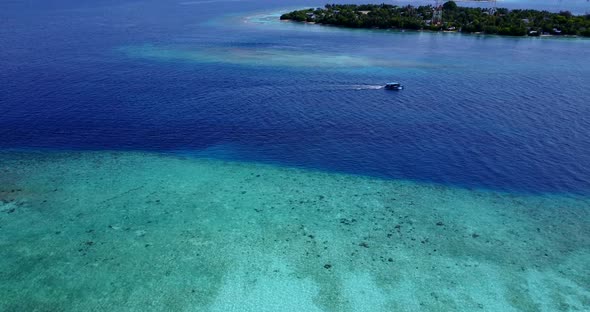 Beautiful drone copy space shot of a white sand paradise beach and blue ocean background  alt