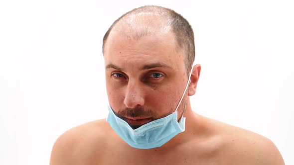 Man Naked in a Medical Mask