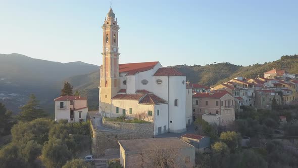 Civezza town and San Marco Evangelista church aerial view in Liguria, Italy, Mediterranean village alt