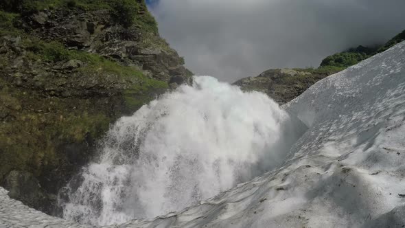 Cascade Waterfall Falling in Snowball