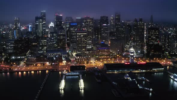 Cinematic Aerial Panorama of Beautiful American City at the Bay at Night Time  alt