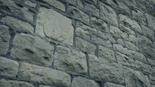 Passing Large Rock House Wall alt