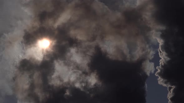 Sun Covered By Black Clouds of Smoke alt
