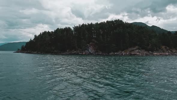 An Islet in the Middle of the Sea with a Spruce Forest alt