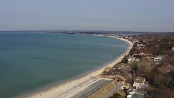 A high angle aerial view over Meschutt Beach on Peconic River, Long Island, NY. The drone camera boo alt