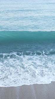 Vertical Video Sea Near the Coast  Closeup of the Coastal Seascape alt