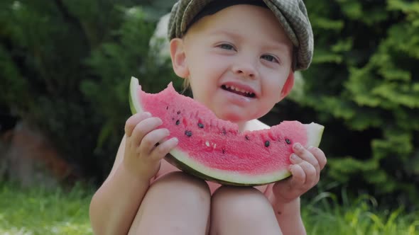 Portrait of Cute Baby Eating Watermelon alt