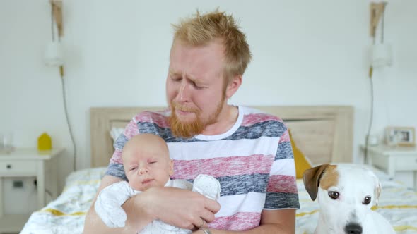 dad hysterically trying to put an infant to sleep