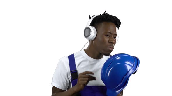 African American Worker Listening To Music on Headphones. Alpha Channel alt