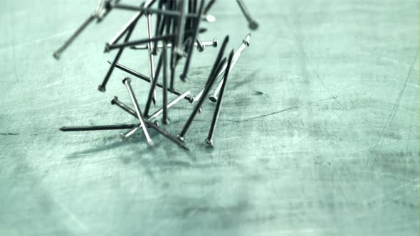 A Bunch of Nails Fall on the Table alt