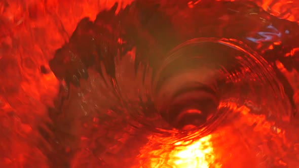 Symbol of Hell, Inferno and Infinity. Red Liquid Hypnotic Aqua Swirl Turning. Meditative Ruby alt
