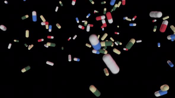 Colorful medicines fall down pills, antibiotics, vitamins,