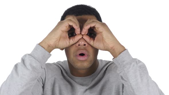 AfroAmerican Man at Work Searching New Chance with Handmade Binocular alt