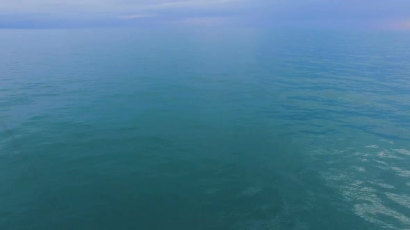 Two People in Love Standing at Bow of Boat Sailing Towards Horizon, Newlyweds alt