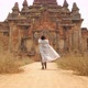 Young Tourist Woman Waling To Old Traditional Burmese Temple and Making Photos on Camera. Travel - VideoHive Item for Sale