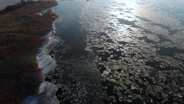 Beautiful Pattern Of Melting Ice On River Aerial