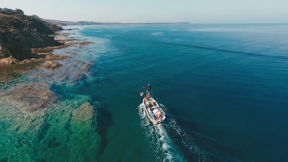 Fishing boat in the sea. alt