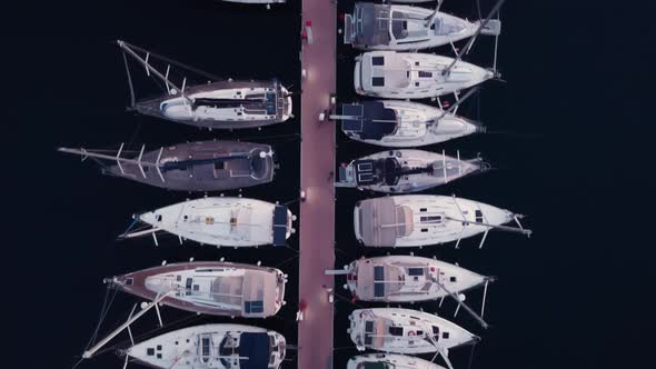 Top View of Yachts Standing on the Pier in Mediterranean Sea at Summer Day Filmed By Drone alt