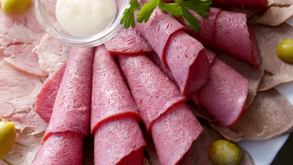 Meat Delicatessen  Ham Bacon Veal Tongue and Jamon on Plate alt