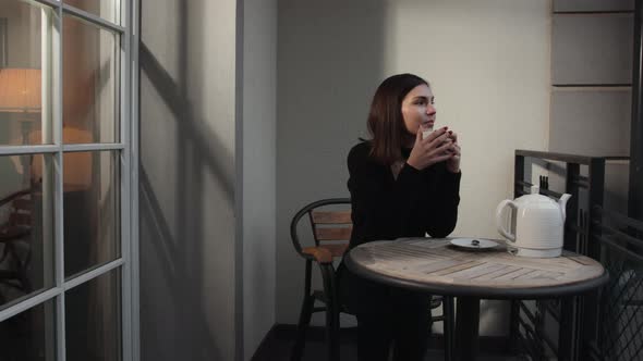 Charming Dreamy Girl Drinking Aromatic Coffee at Home House Indoors alt