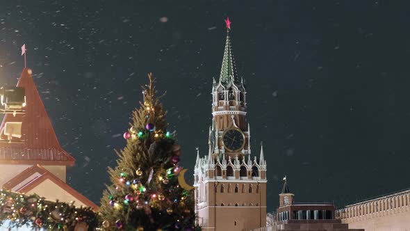 Night View of the Clock of the Moscow Kremlin on the Spasskaya Tower Through the Flying Snow