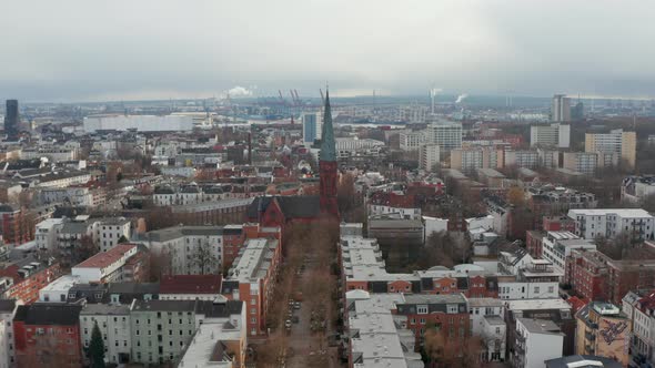 Aerial View of St Peters Church in Hamburg Surrounded By Urban Apartment Buildings alt