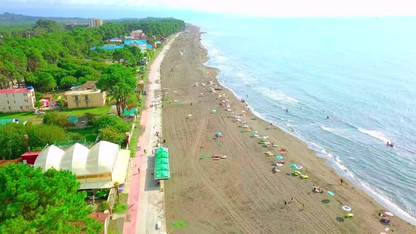 Drone footage of a black sand beach in Georgia Magneti, alt