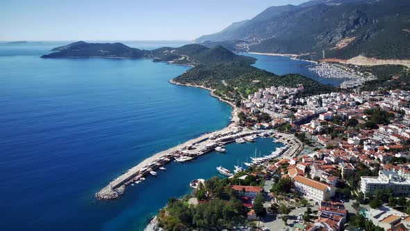 The top view from the drone of Kas resorts, bay, yahts, city in Mugla in Turkey alt