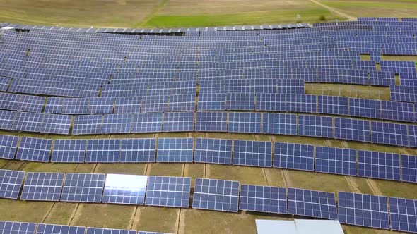 Solar Panels Farm (solar cell). Renewable green alternative energy concept - Aerial view