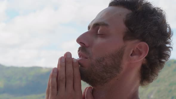 Closeup Portrait Caucasian Man Praying to God Being in Peace of Mind Whispering a Prayer in a Quiet alt