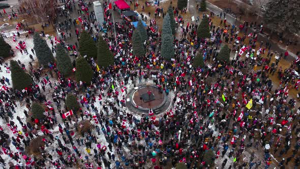 Crowd with speaker pull out wide shot Calgary Protest 12th Feb 2022 alt