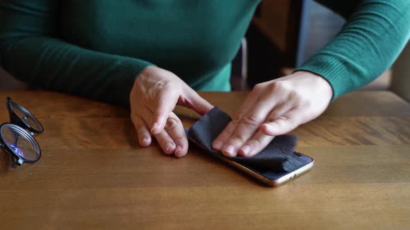 Woman Hands Wipe Phone