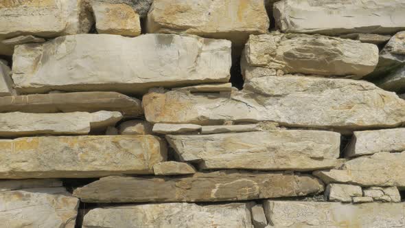 Stone wall slow panning 4K 2160p UHD footage - Stone wall araned parts 4K 3840X2160 UHDvideo alt