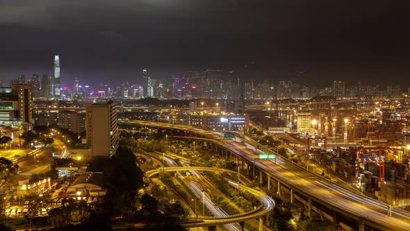 Container Port Heavy Traffic on Hong Kong Night Overpass Highways alt