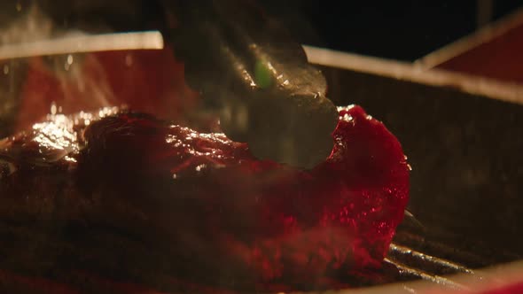 Grilling of Steak Close Up alt