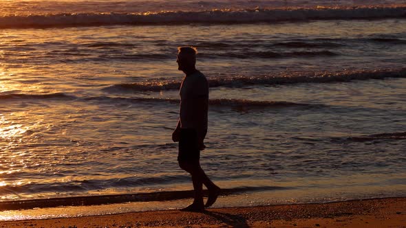 Senior Man Exercising At The Beach alt