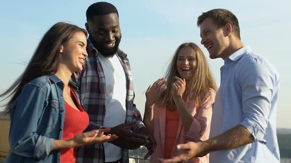 Cheerful Friends Enjoying Roof Party, Having Fun Time Together, Slow-Motion