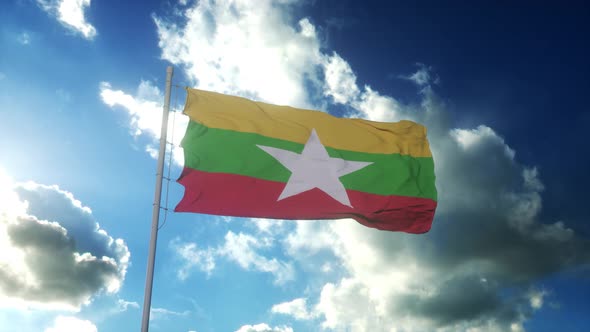 Flag of Myanmar Waving at Wind Against Beautiful Blue Sky alt