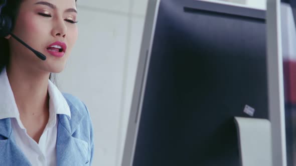 Customer Support Agent or Call Center with Headset Talking to Customer on Phone alt