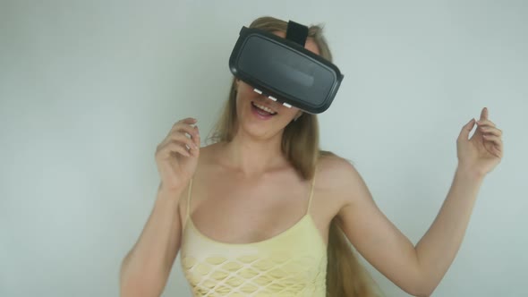 Beautiful Woman In A Helmet Virtual Reality Fun Dancing