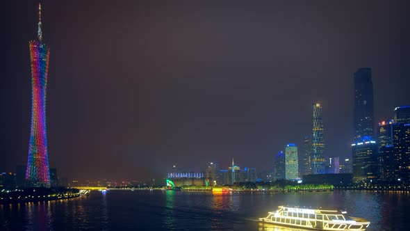 Guangzhou Skyline Over the Pearl River Illuminated in the Evening Panorama alt